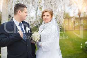 Walking bride and groom in nature