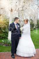 Walking bride and groom in nature