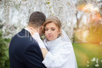 Walking bride and groom in nature