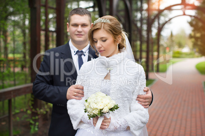 Walking bride and groom in nature