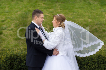 Walking bride and groom in nature