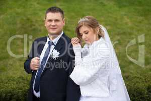 Walking bride and groom in nature