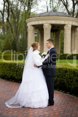 Walking bride and groom in nature