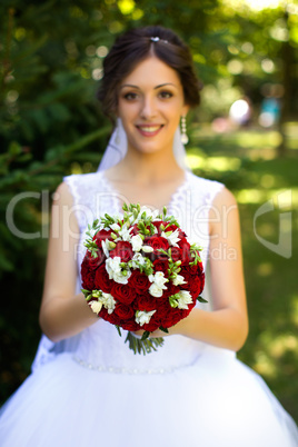 Blonde bride in white dress