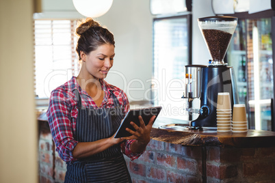 Waitress writing in a book Waitress writing in a book