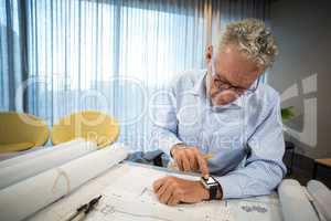 Man adjusting time on his watch