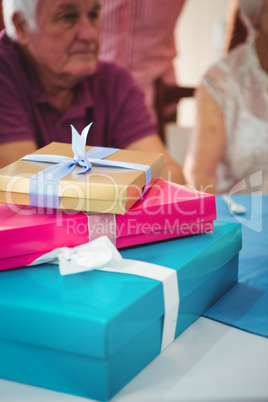 Close-up of three colorful gifts