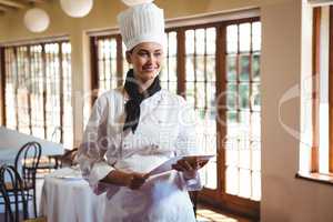 Chef holding a document