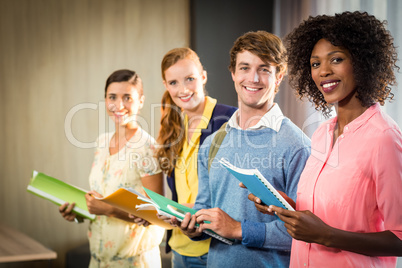 Business people holding files