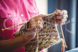 Close-up of someone doing knitting