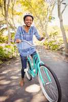 Happy woman doing bicycle
