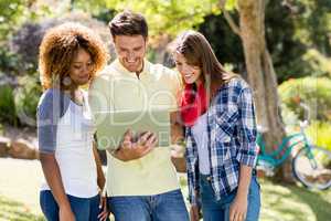 Group of friends using laptop