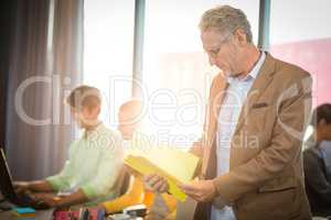 Businessman looking at document