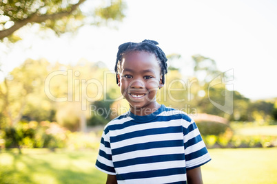 Boy smiling in front of the camera