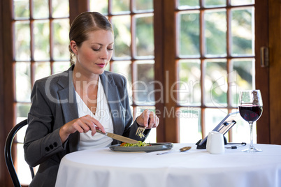 Woman eating a meal
