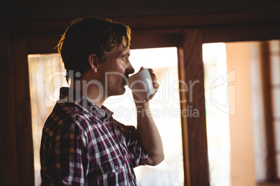 Man drinking a coffee alone