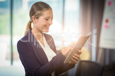 Businesswoman using digital tablet