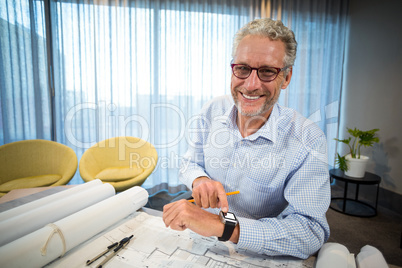 Man adjusting time on his watch