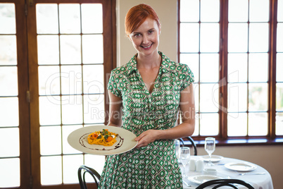 Woman holding a plate