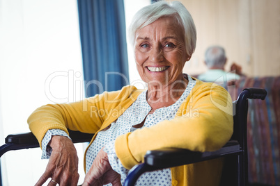 Smiling senior woman on a wheelchair