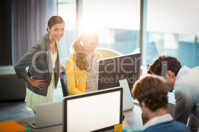 Business people working on computer