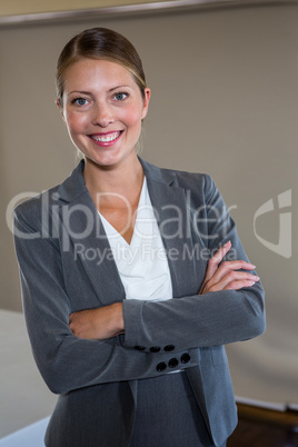 Woman standing with arms crossed