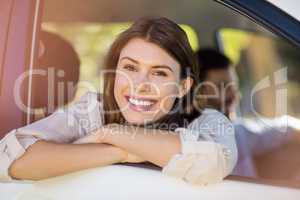Beautiful woman looking out from car window