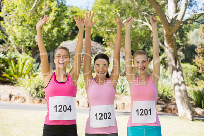 Young athlete women posing after victory