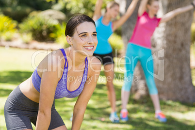 Beautiful young woman taking a break after work out