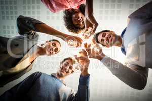 Portrait of business people toasting wine glasses