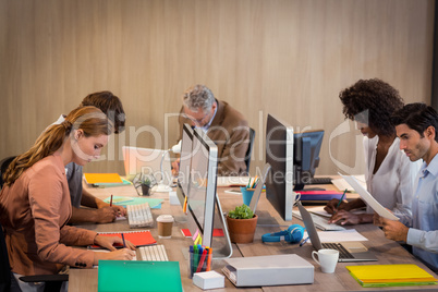 Concentrated business people working Concentrated business people working
