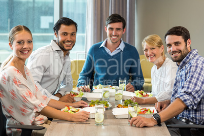 Business people having breakfast