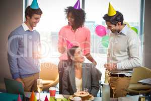 Business people celebrating birthday