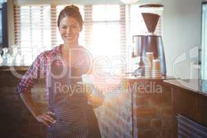 Waitress holding a cup of coffee