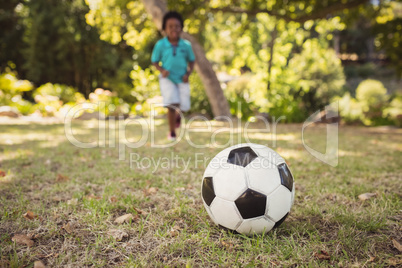 happy child playing football