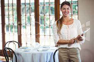 Woman holding a clipboard