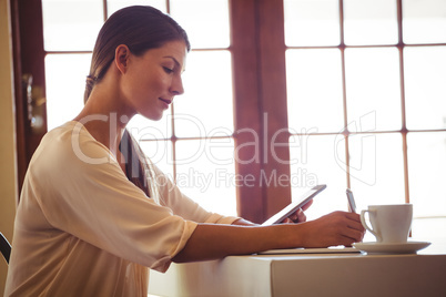 Woman writing in a notebook