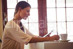 Woman writing in a notebook