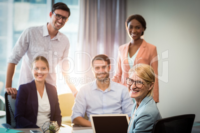 Business people sitting at desk