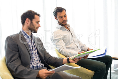 Businessman interacting with coworker