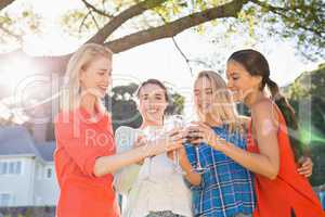 Beautiful women toasting a glasses of red wine