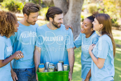 Group of volunteer holding box