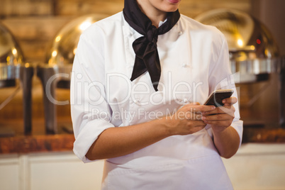 Chef using a smartphone