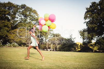 Daughter holding balloon