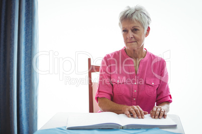 Portrait of a worried retired woman