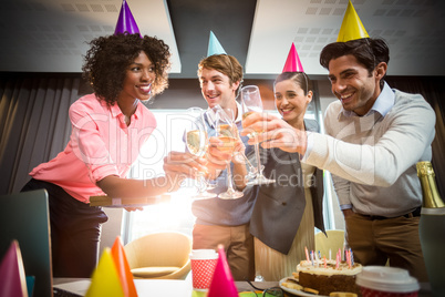 Business people celebrating birthday