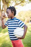 Boy holding an object