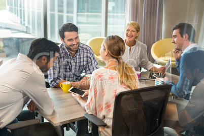 Business people interacting during a meeting