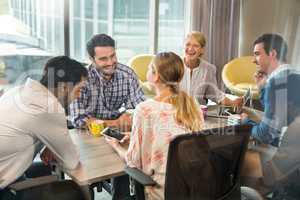 Business people interacting during a meeting