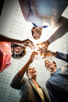 Business people toasting wine glasses